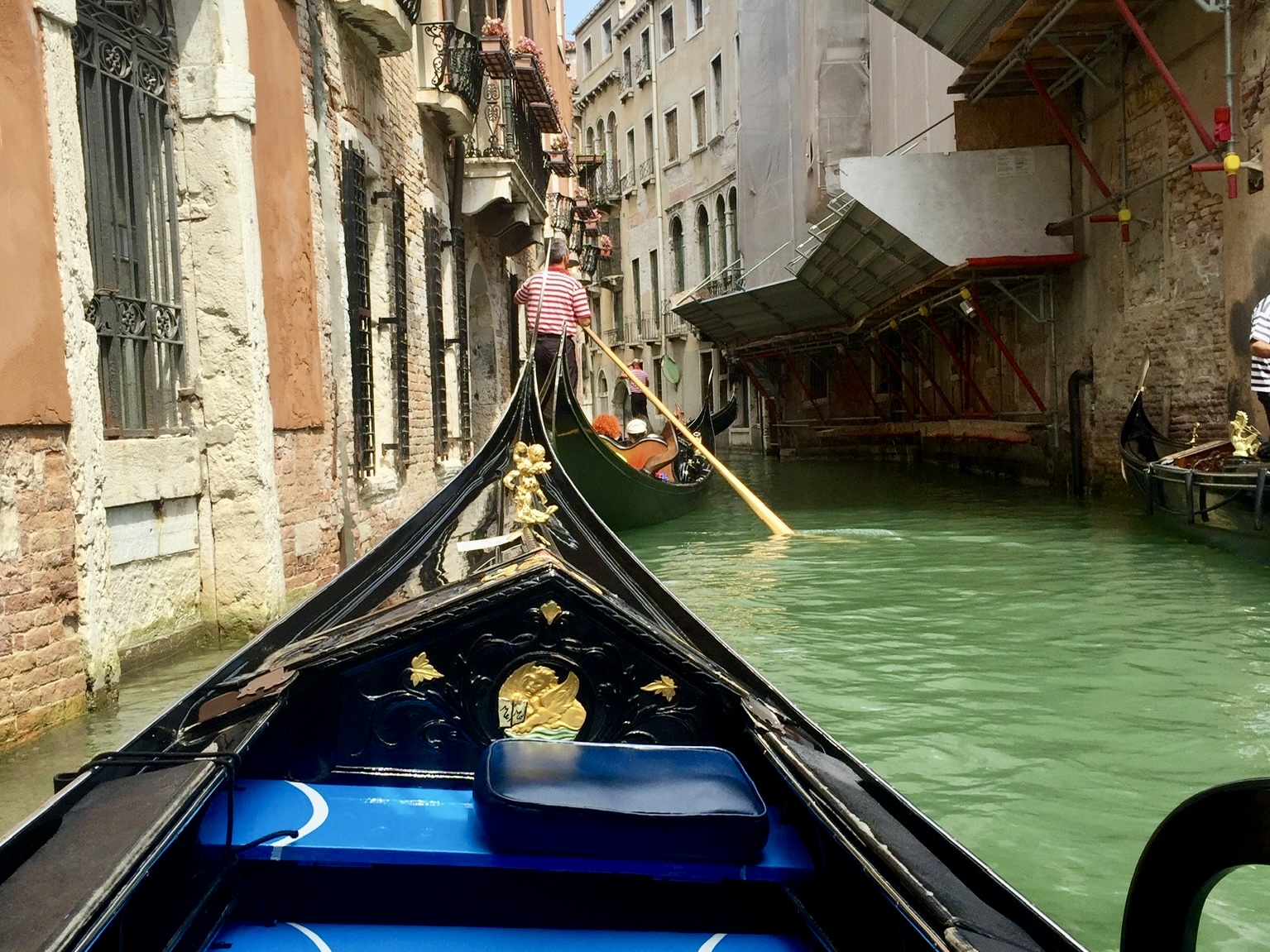 Gondola Ride on Canal in Venice